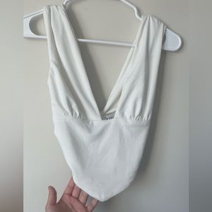 White low-cut tie-back tank top size small.